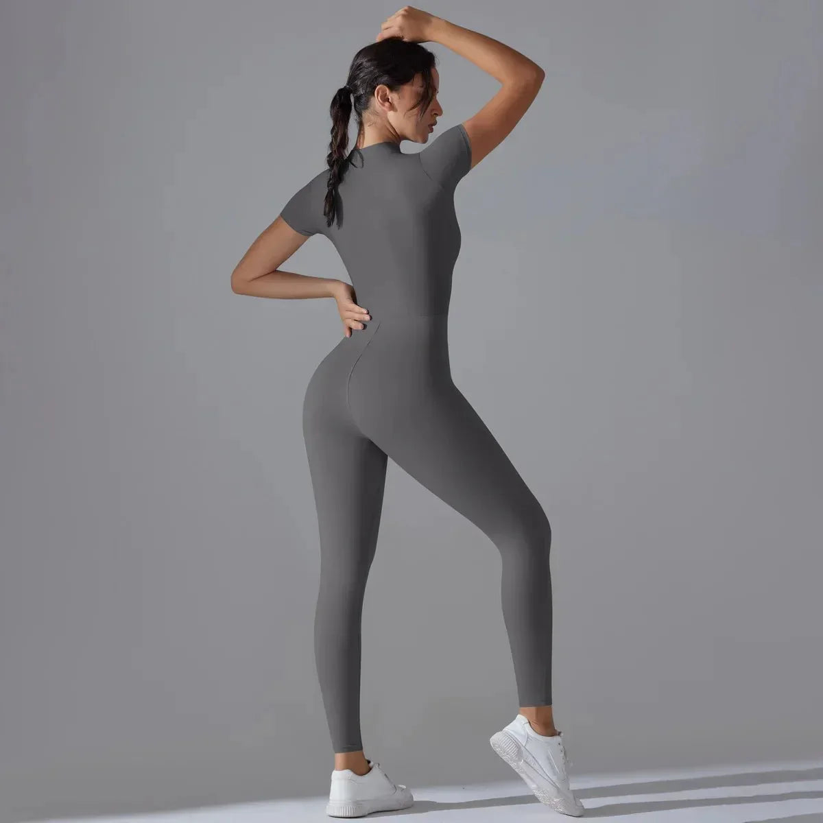 PilatessEmpower Women's Fitness Jumpsuit with Half-Zipper – Versatile Workout Apparel for Indoor and Outdoor Activities